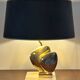 Brass lamp in the shape of a fish by Somchai Hattakitkosol.