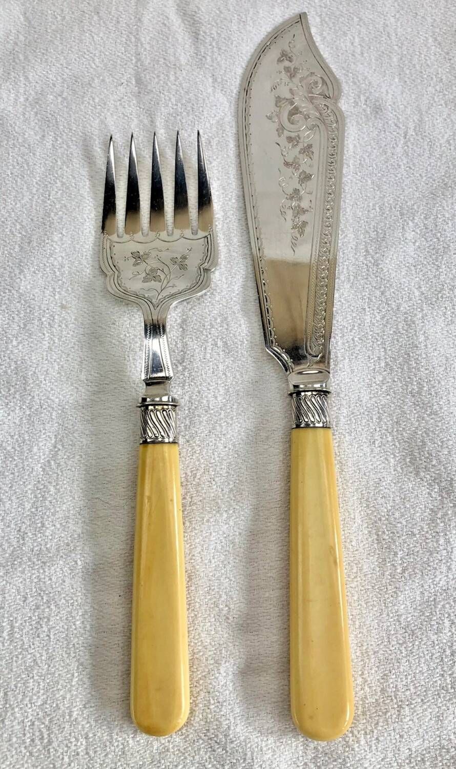 Antique Victorian fish serving cutlery, bone and silver-plated metal