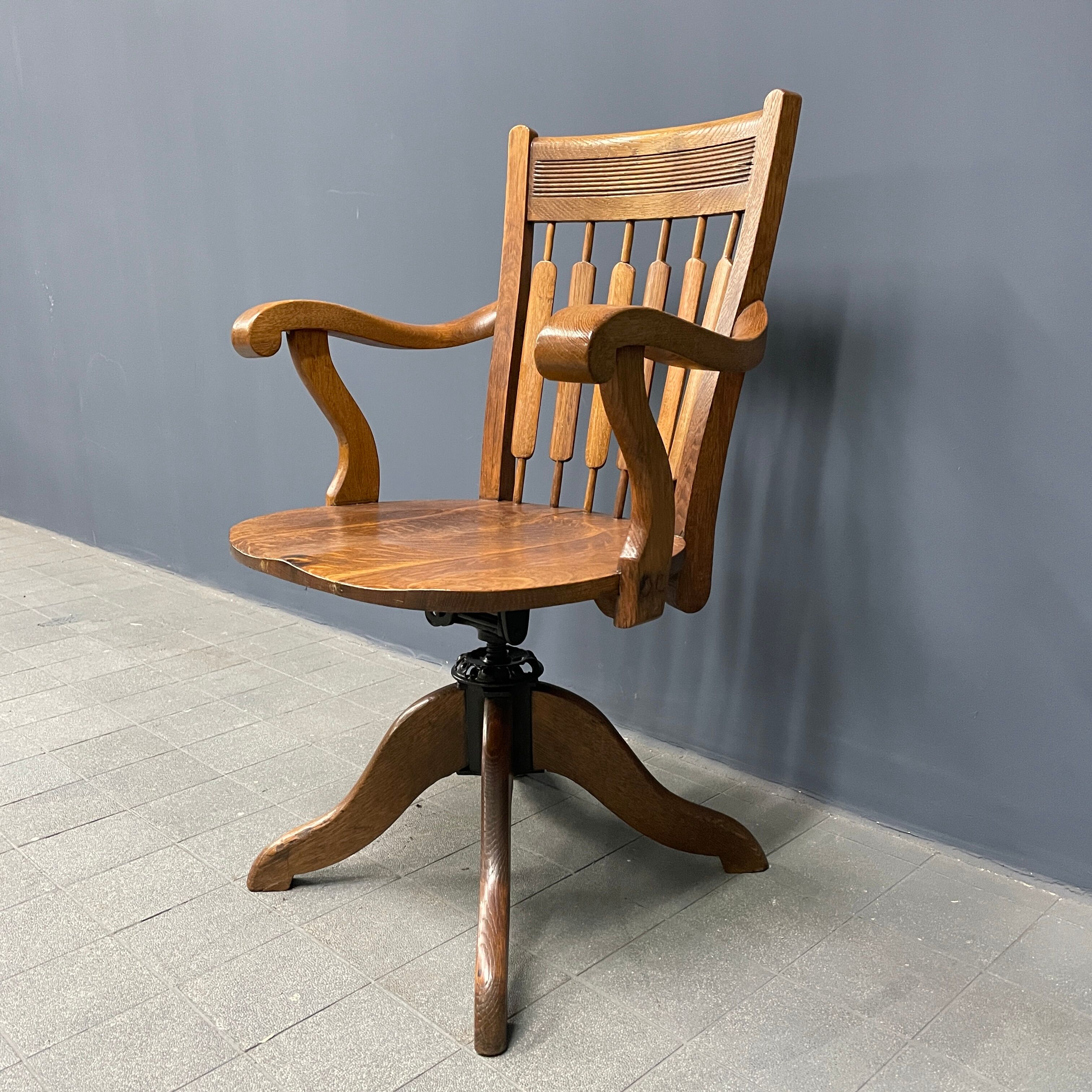Antique American oak office chair with armrests 1920s