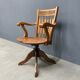Antique American oak office chair with armrests 1920s