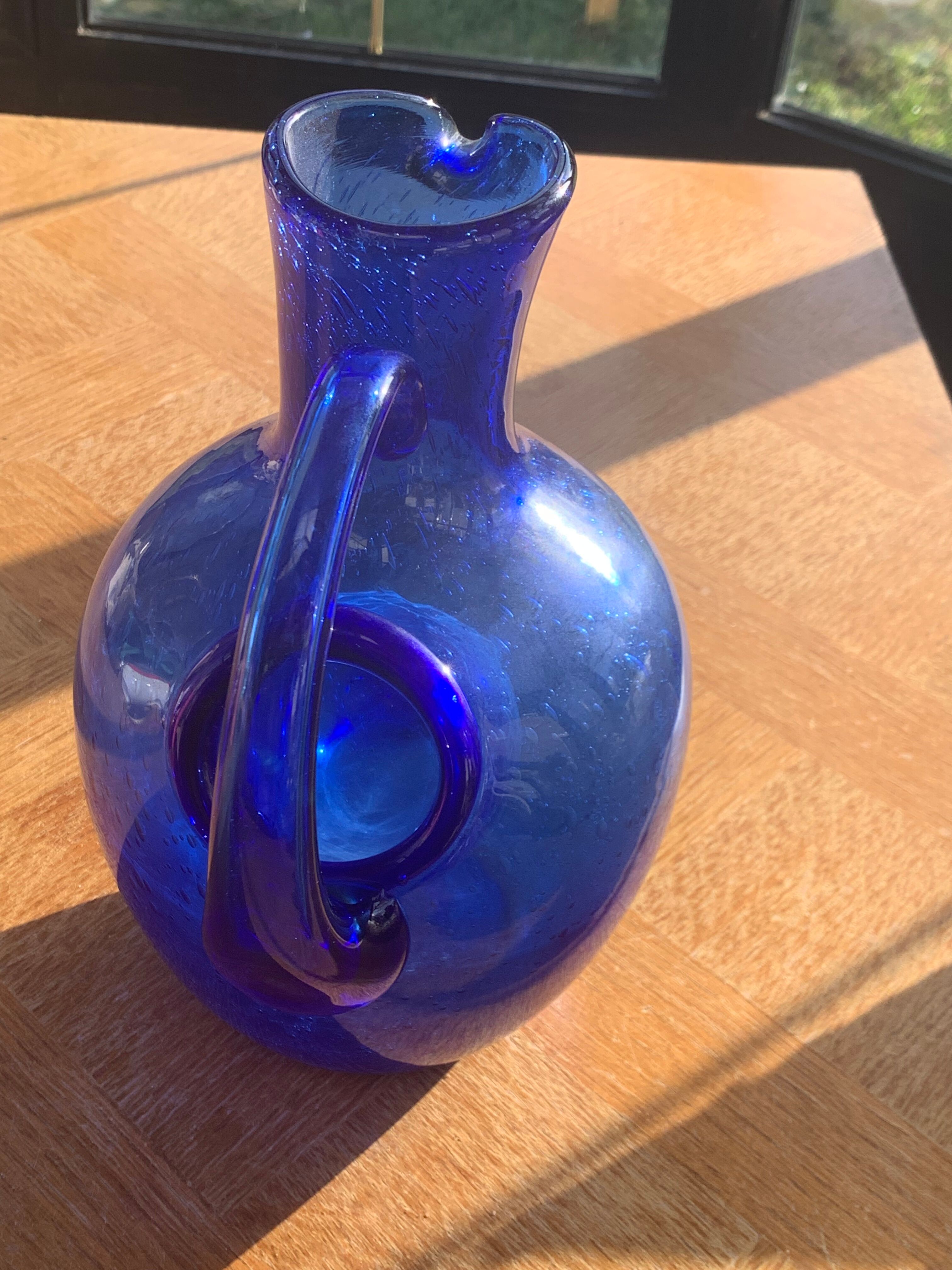 Blue blown glass ice decanter from vintage biot glassware