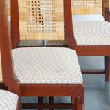 et of 6 wooden Art Deco design dining chairs with a wicker seat and backrest