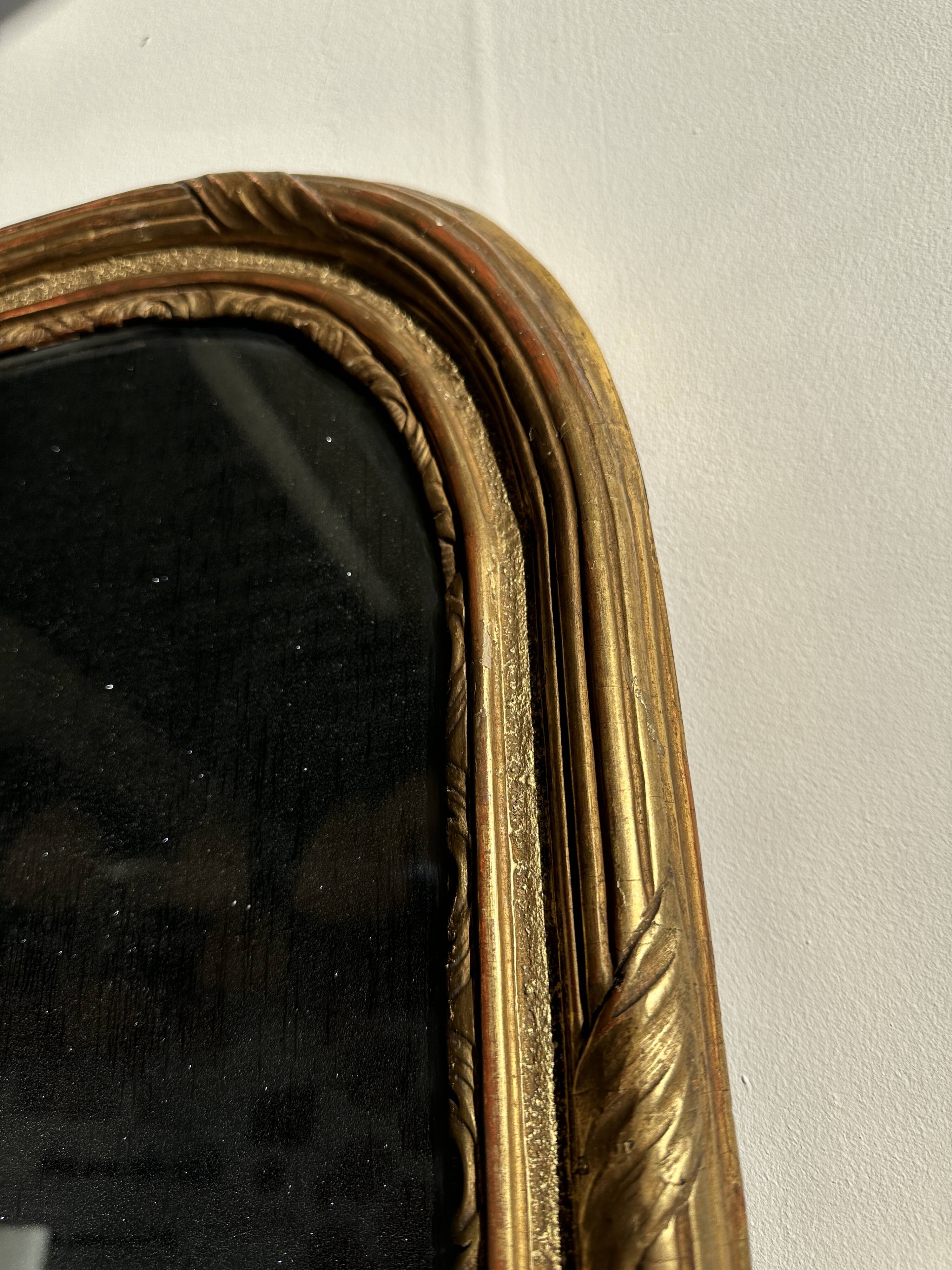 Large gilded mirror 19th century rounded corners mercury glass Louis XVI style