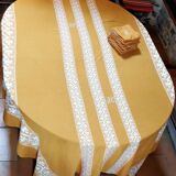 Mustard yellow tablecloth with towels