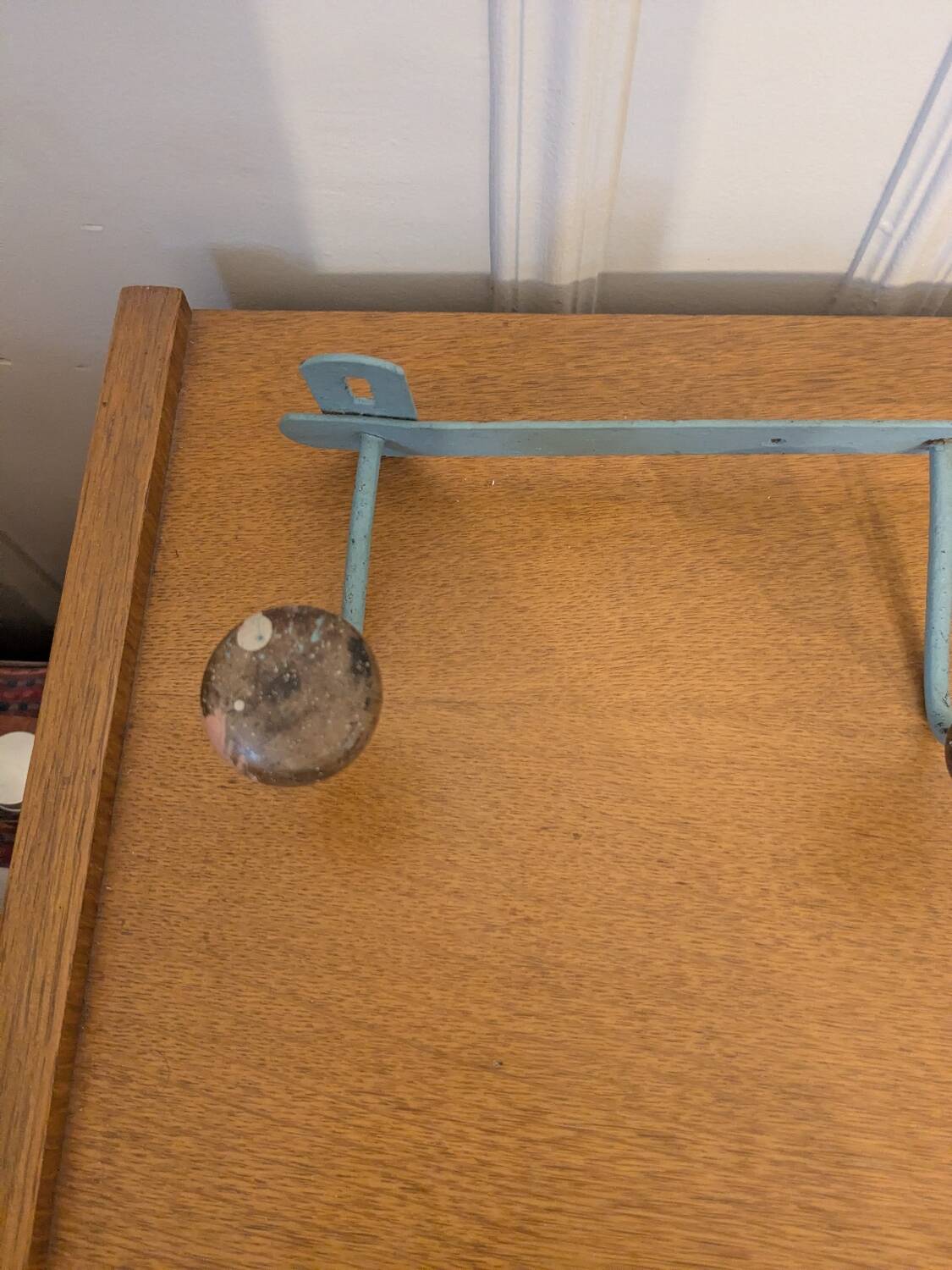 Vintage wall-mounted coat rack