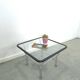 Glazen jaren 70 salontafel met chromen onderstel vintage