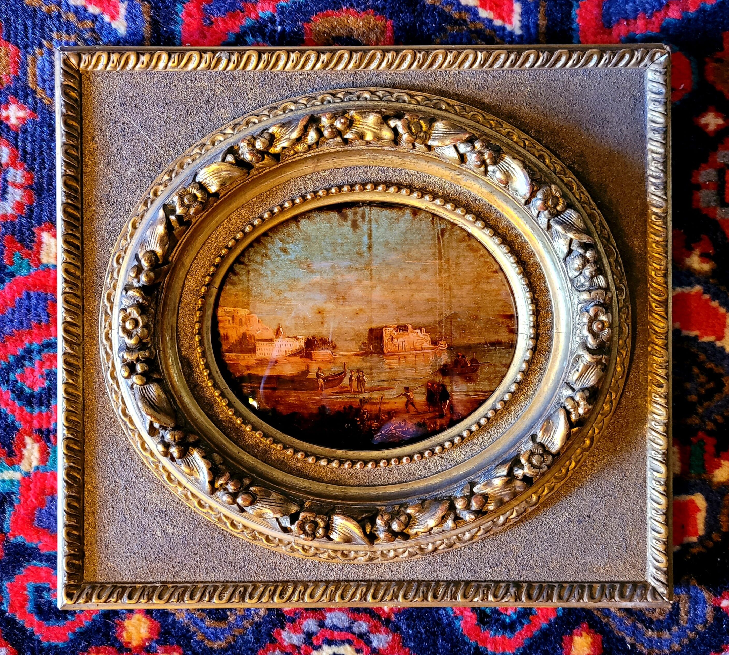 Old painting fixed under nineteenth century glass and vintage gilded frame