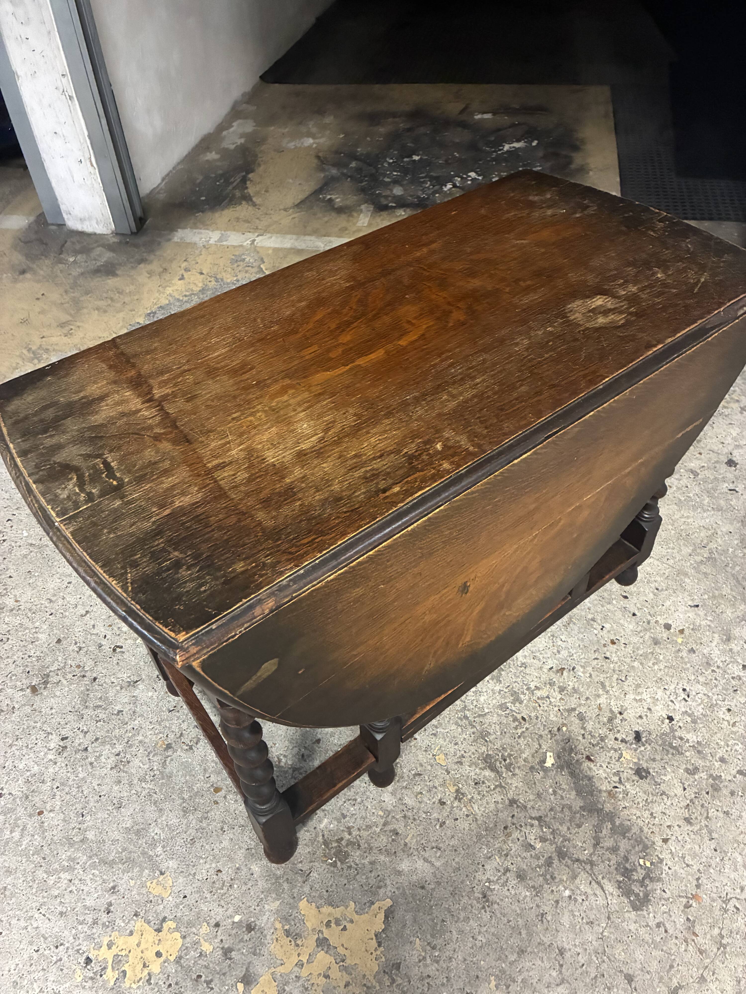 Folding wooden table with twisted legs