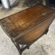 Folding wooden table with twisted legs