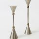 Pair of postmodern candlesticks in Memphis style made of steel and brass.