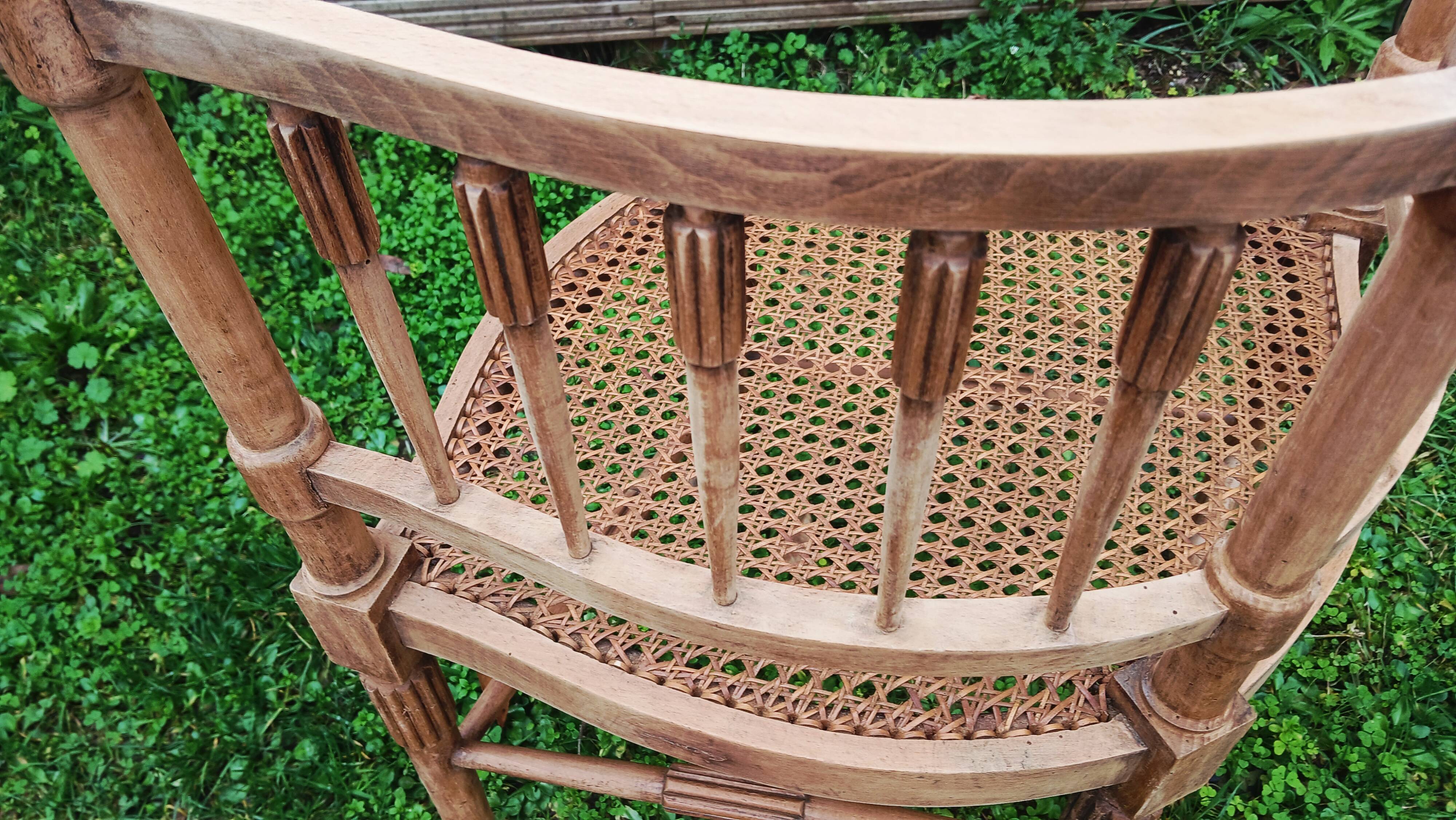Corner chair in beech, caned seat from the early 20th century.