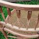 Corner chair in beech, caned seat from the early 20th century.