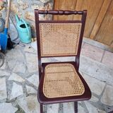 2 vintage caned folding chairs
