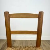 Pair of old wooden and straw children's chairs.