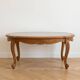 Cherry wood coffee table in Louis XV style  
Glass top  
Dimensions: 115*63 cm