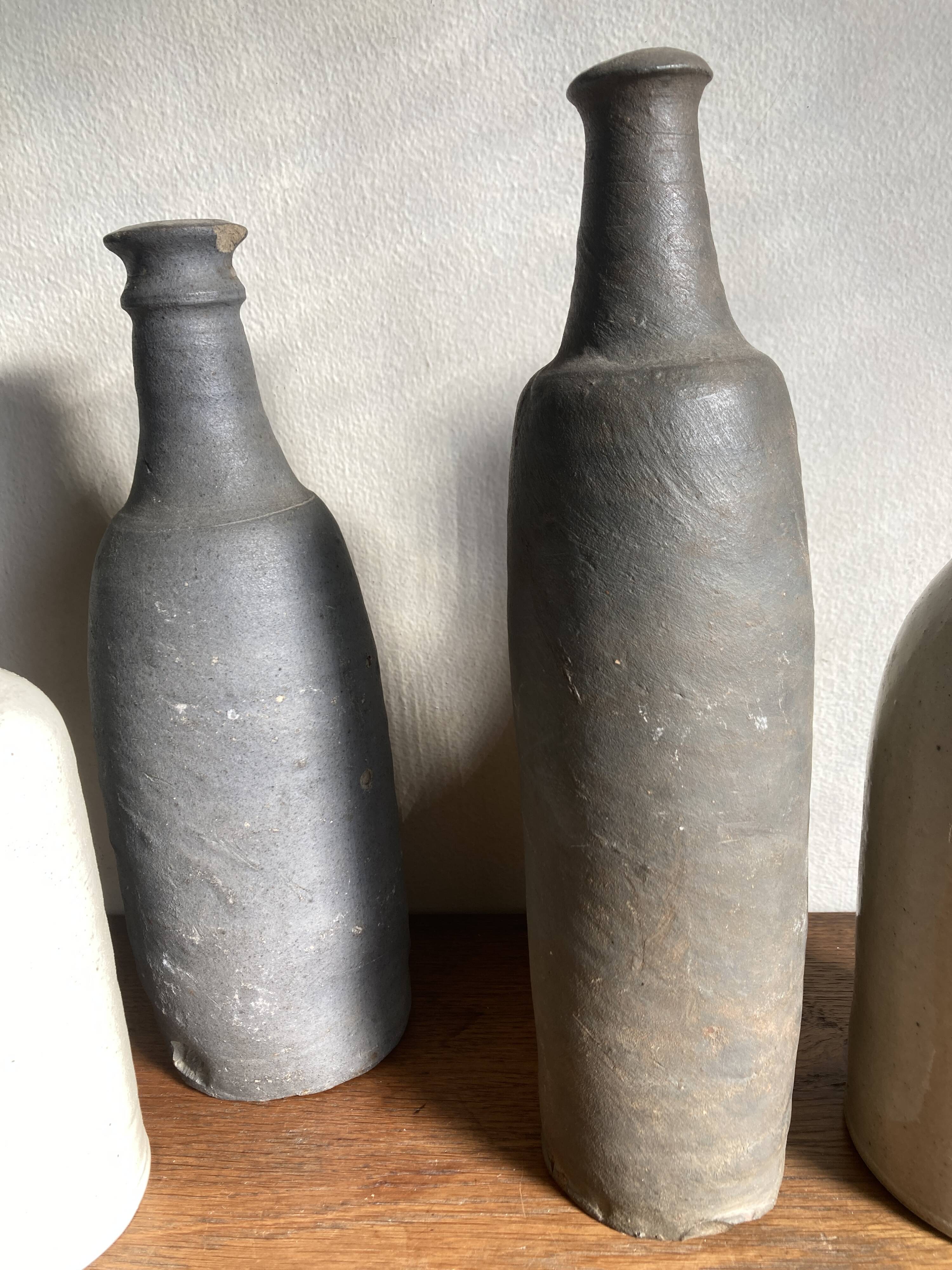 Set de 6 bouteilles de grès et terre cuite 1900-1930
