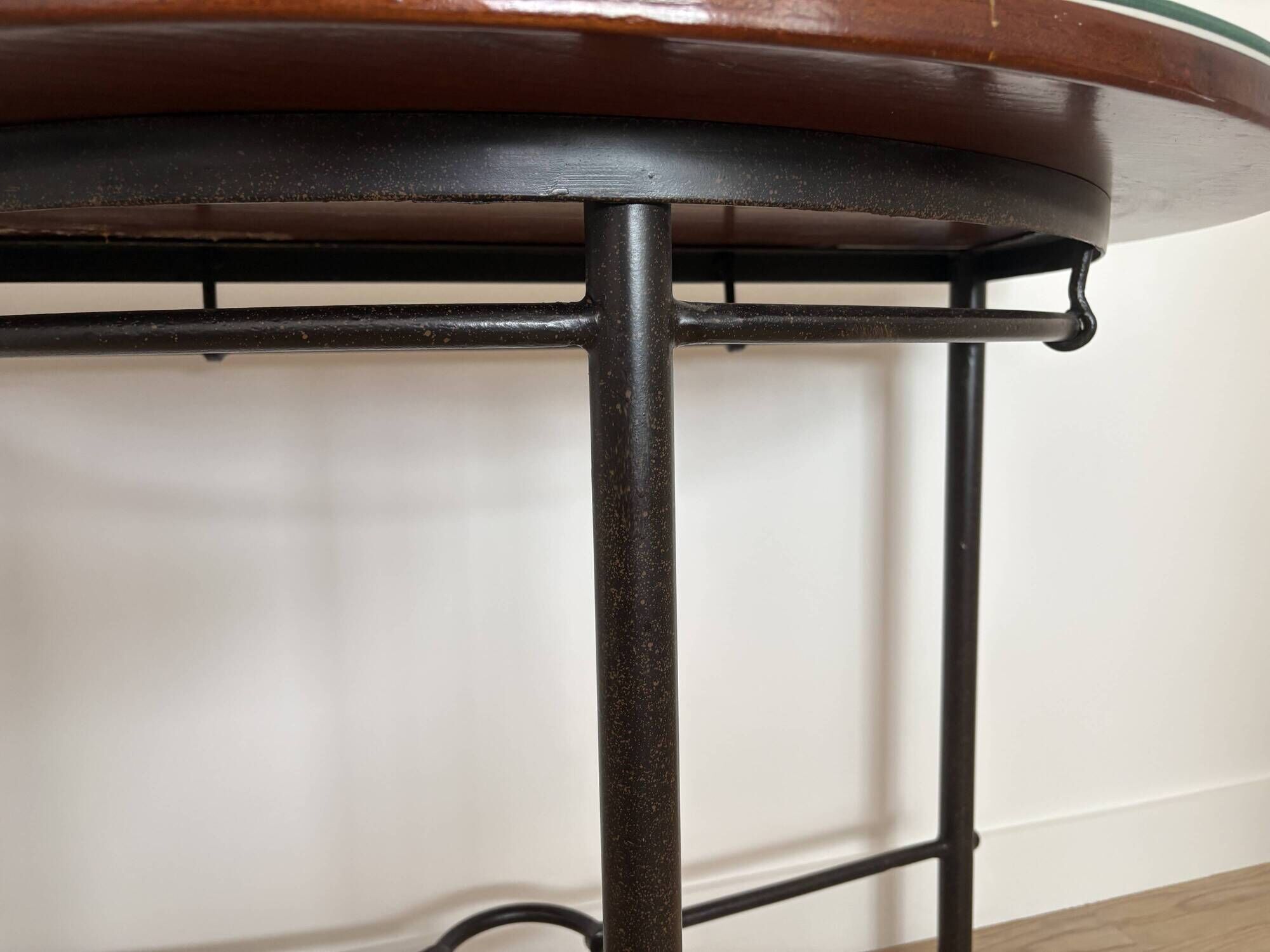 Half-moon console grange in solid cherry wood and wrought iron with a glass top.