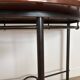 Half-moon console grange in solid cherry wood and wrought iron with a glass top.