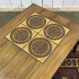 English coffee table in rosewood with tiled section from the 1970s.