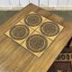 English coffee table in rosewood with tiled section from the 1970s.