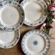Set of 6 mismatched old iron earth flat plates
