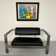 Brutalist living room with faux metal armchairs designed by Karl Friedrich Forster