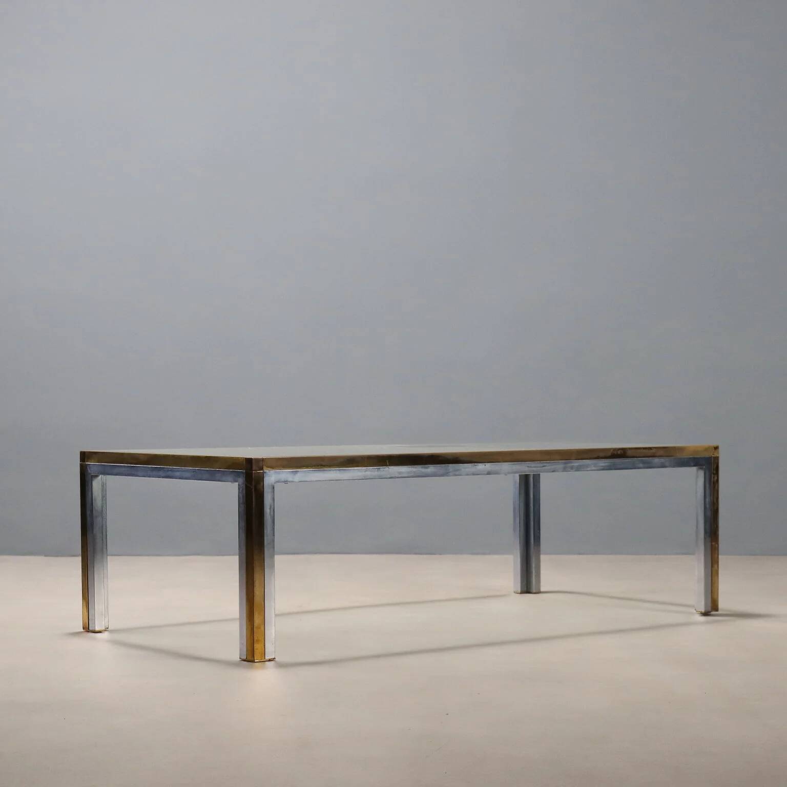 Vintage coffee table in metal, brass and glass, 1970s design.