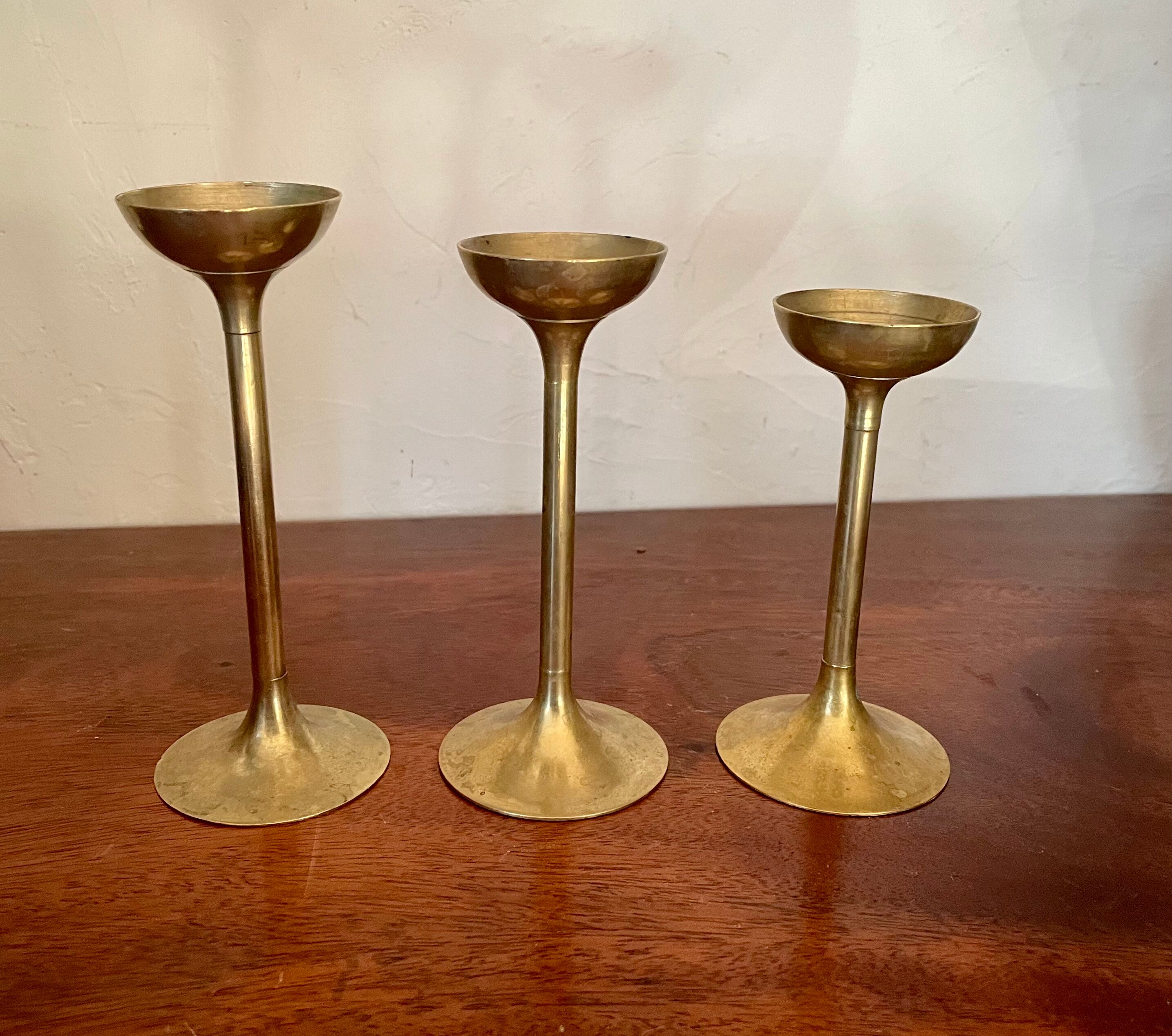 Suite de 3 bougeoirs en laiton vintage