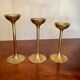 Suite of 3 vintage brass candle holders