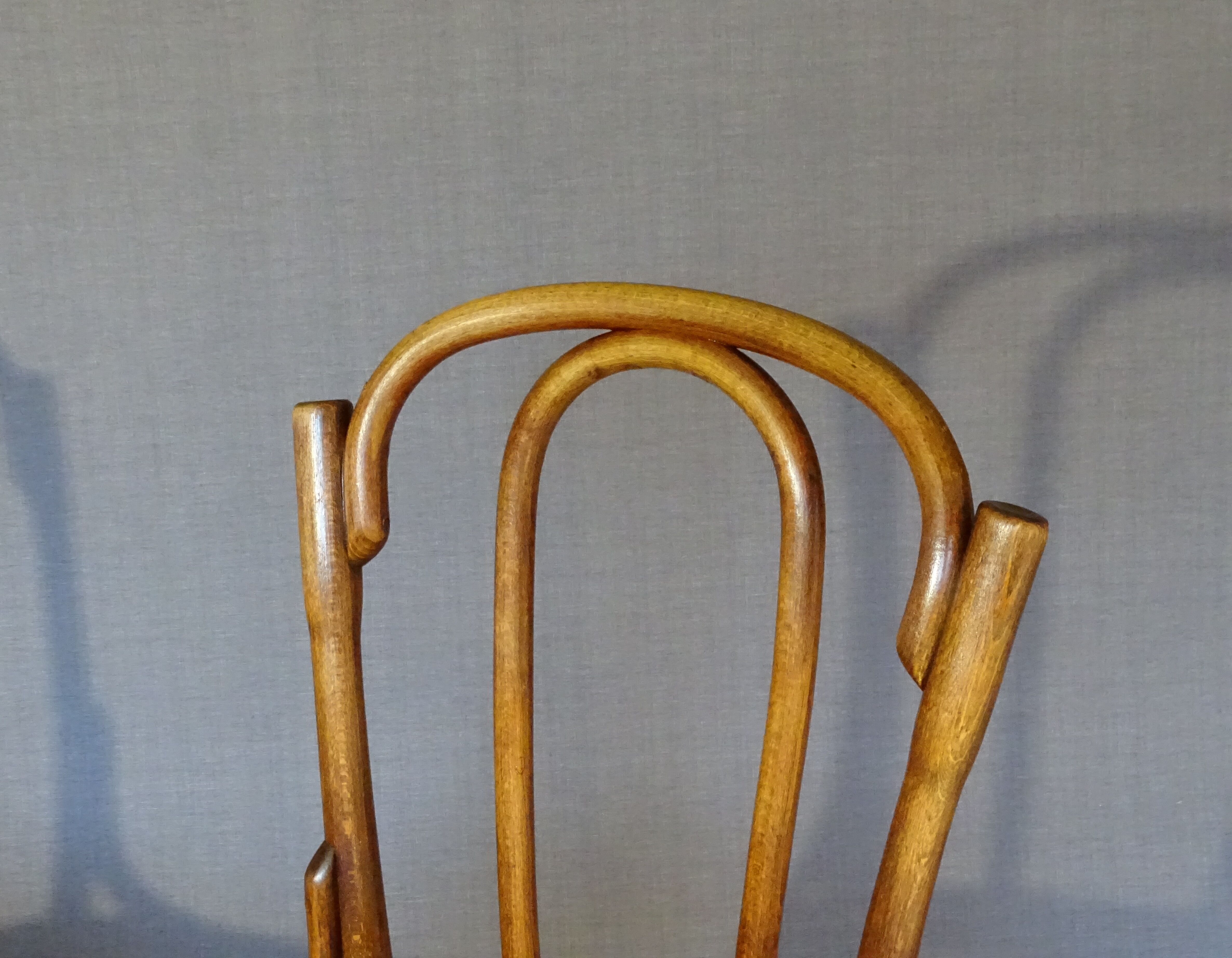Fake pair of Kohn and Turpe tanned bistro chairs, circa 1900,