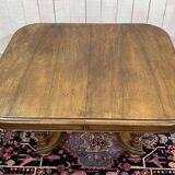 Henri II walnut table from the early 20th century with extensions.