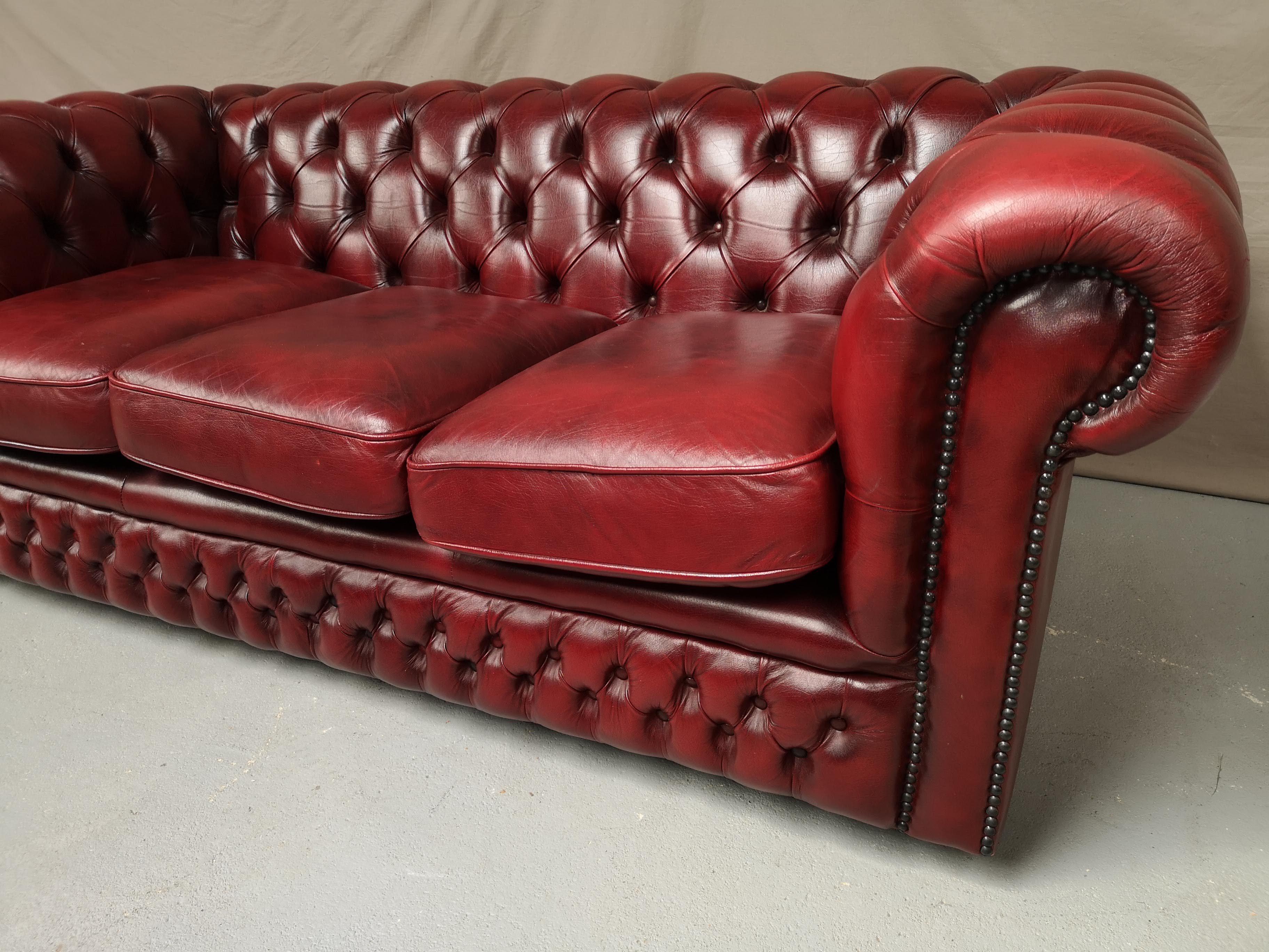 Red leather chesterfield sofa