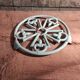 Vintage French light greenish blue cast iron table mat