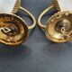 Pair of vintage gold-tone wall sconces with opaline glass globes