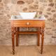 Antique washbasin cabinet in solid pitch pine with a white marble top.