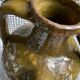 Khaki green glazed terracotta oil jar, 18th-19th century