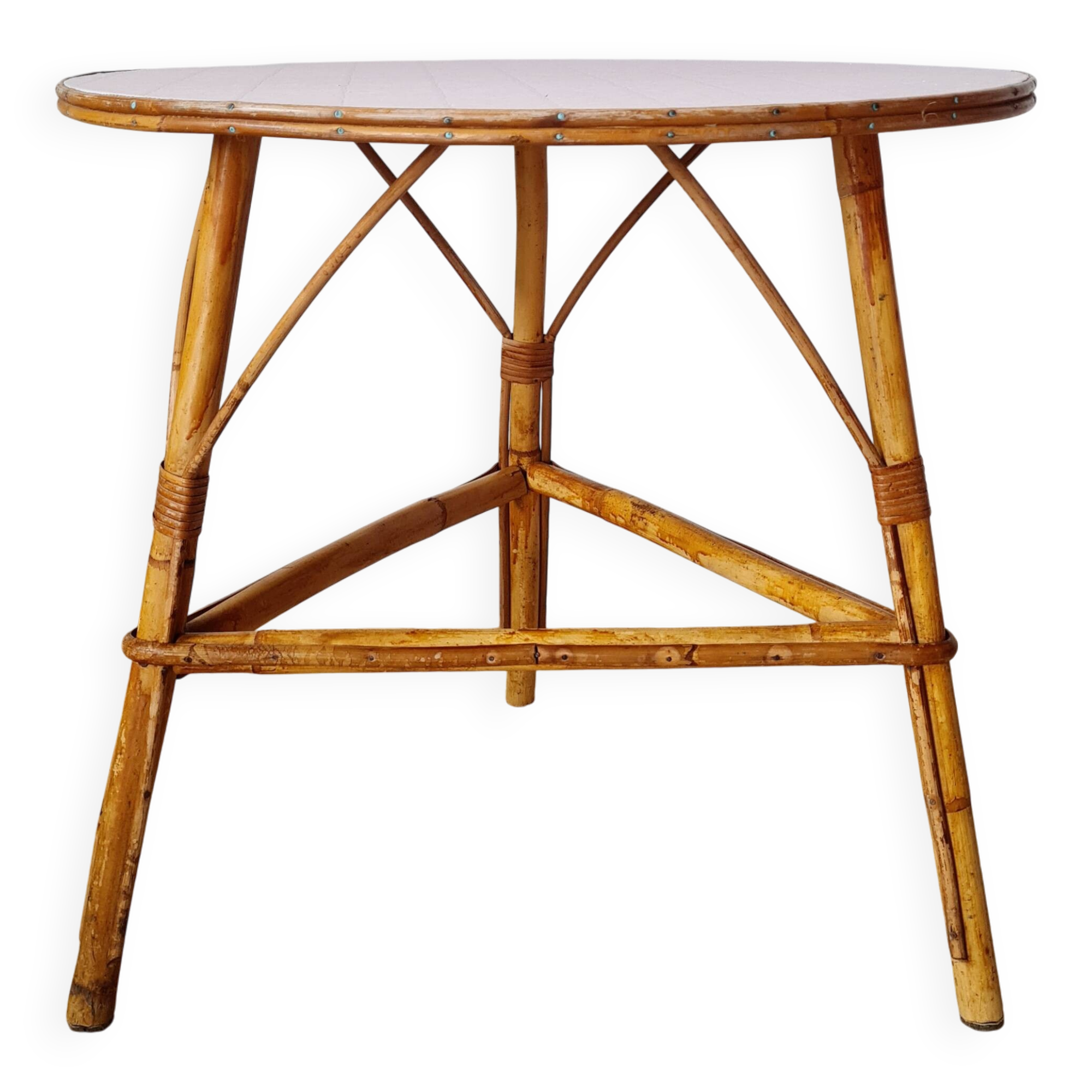 Round soft pink rattan table