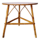 Round soft pink rattan table