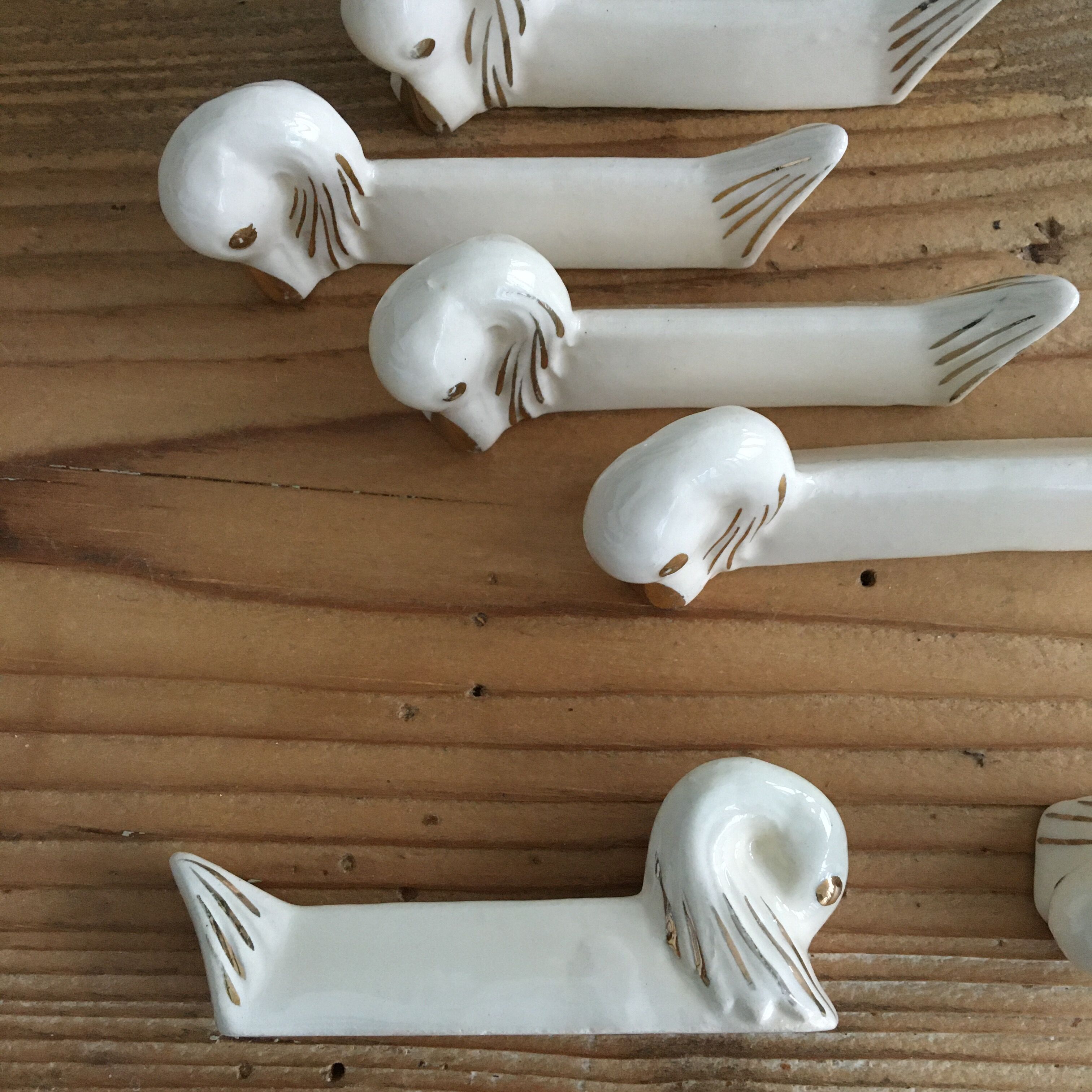 Set of 8 ceramic swan knife holders 50s