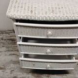 White rattan chest of drawers and bedside table