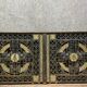 pair of monogrammed cast iron doors from the Art Deco period