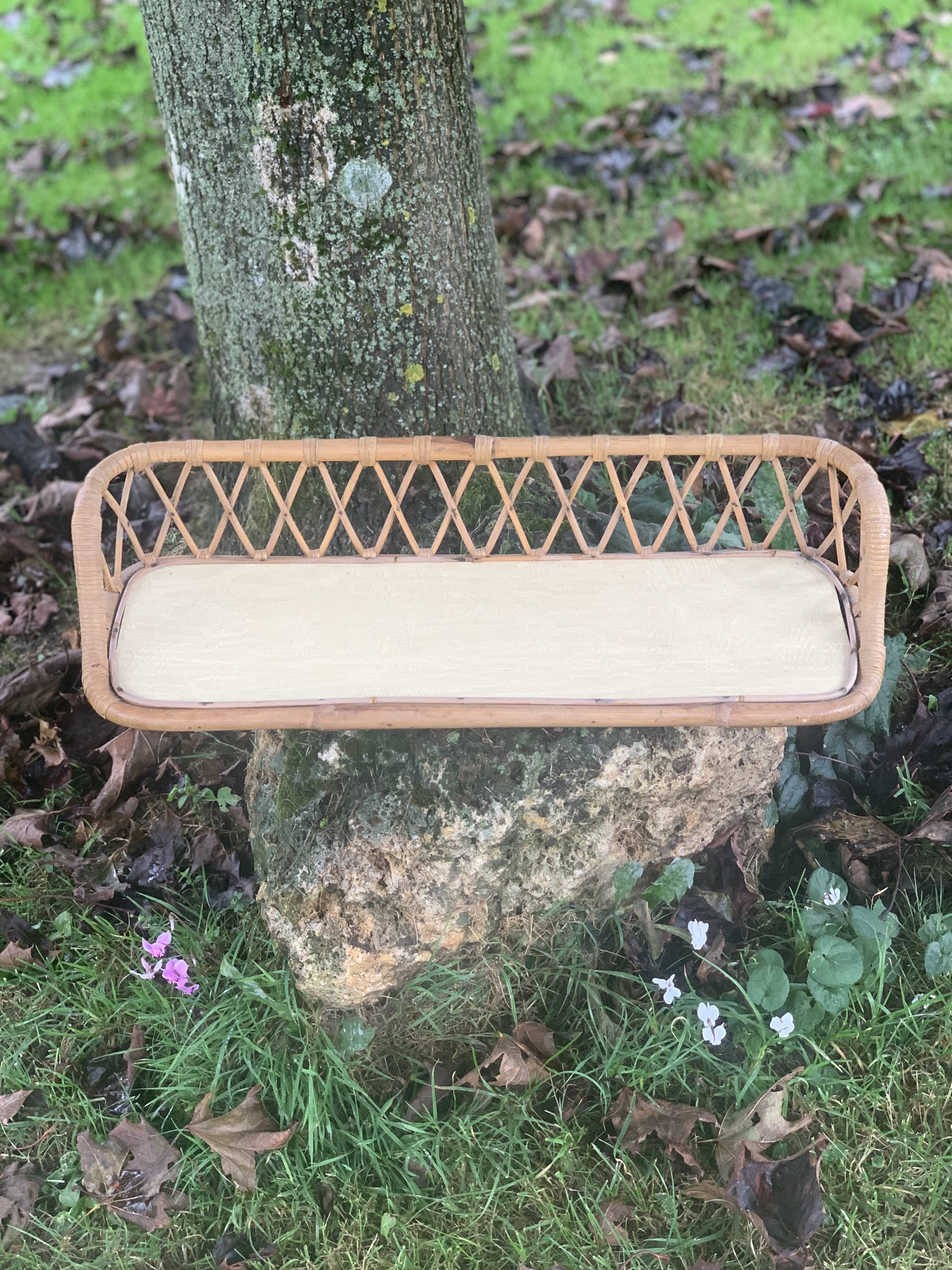 Antique rattan wall shelf