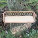 Antique rattan wall shelf