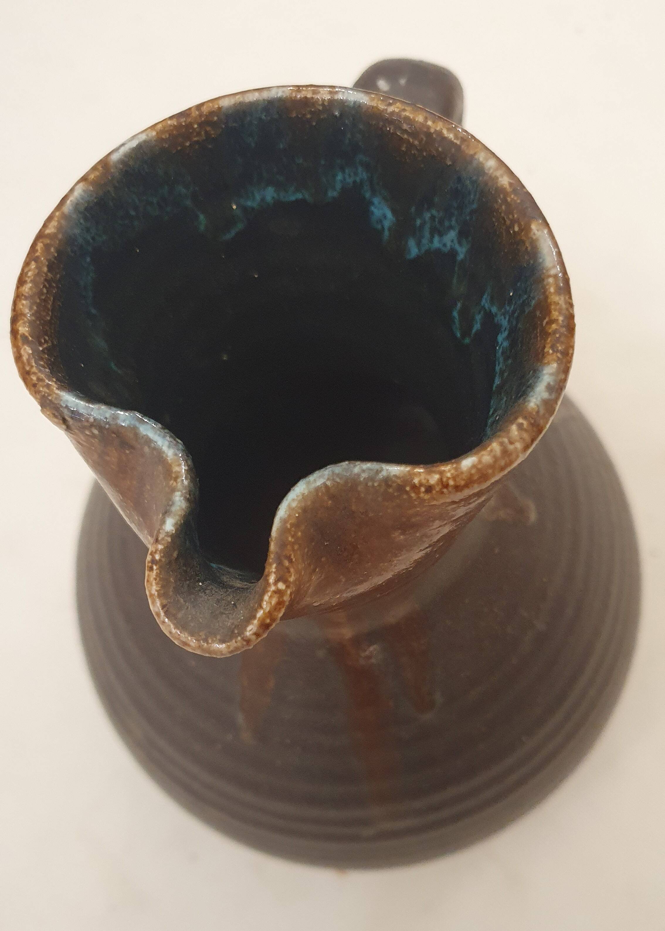 Artisanal jug with flamed interior