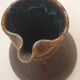 Artisanal jug with flamed interior