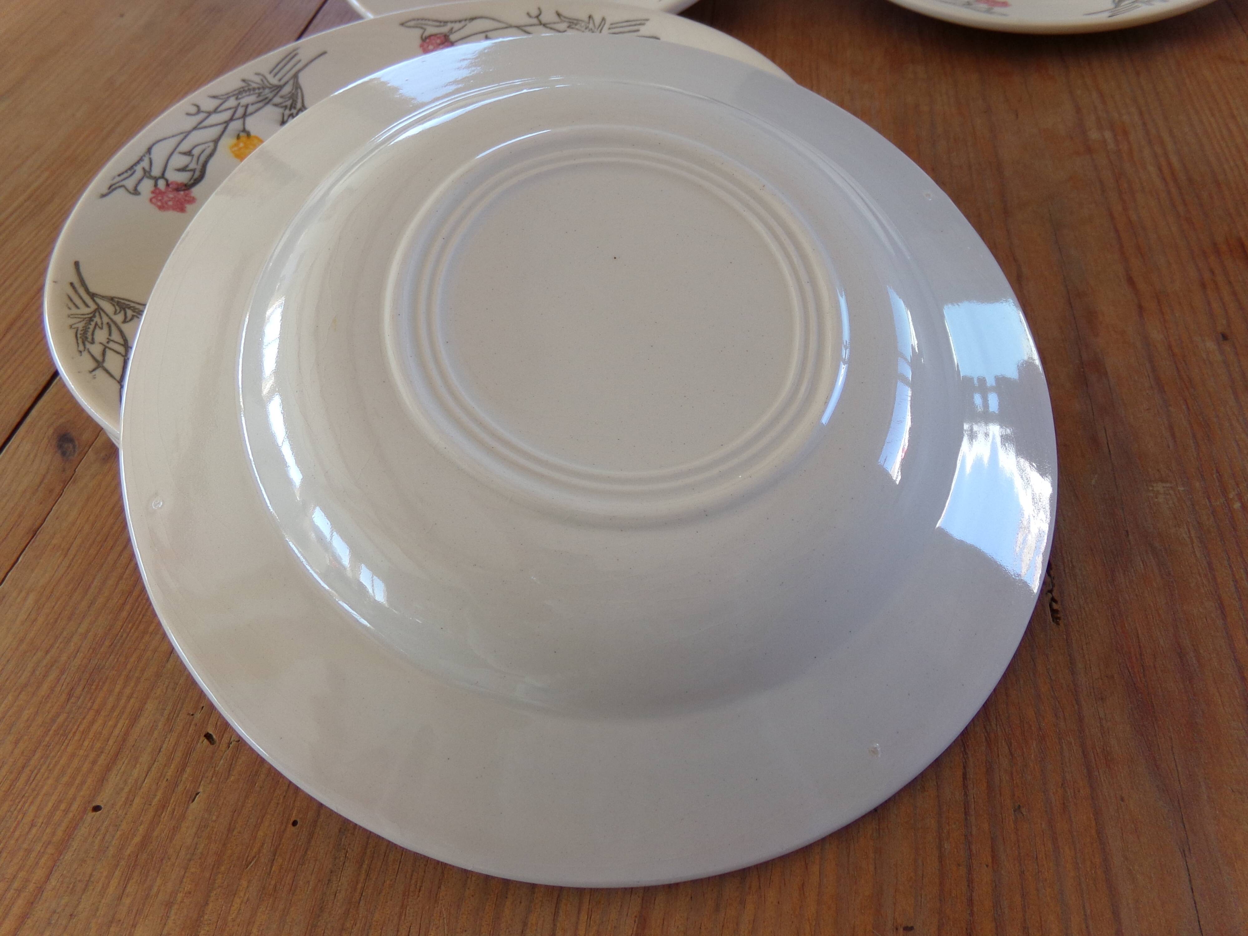 4 hollow plates and 4 old flat plates with floral decoration