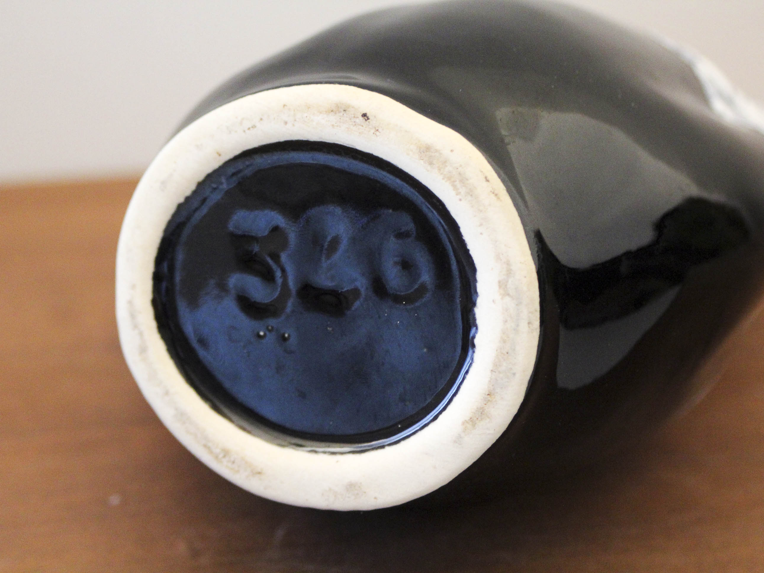 Black and white ceramic pitcher