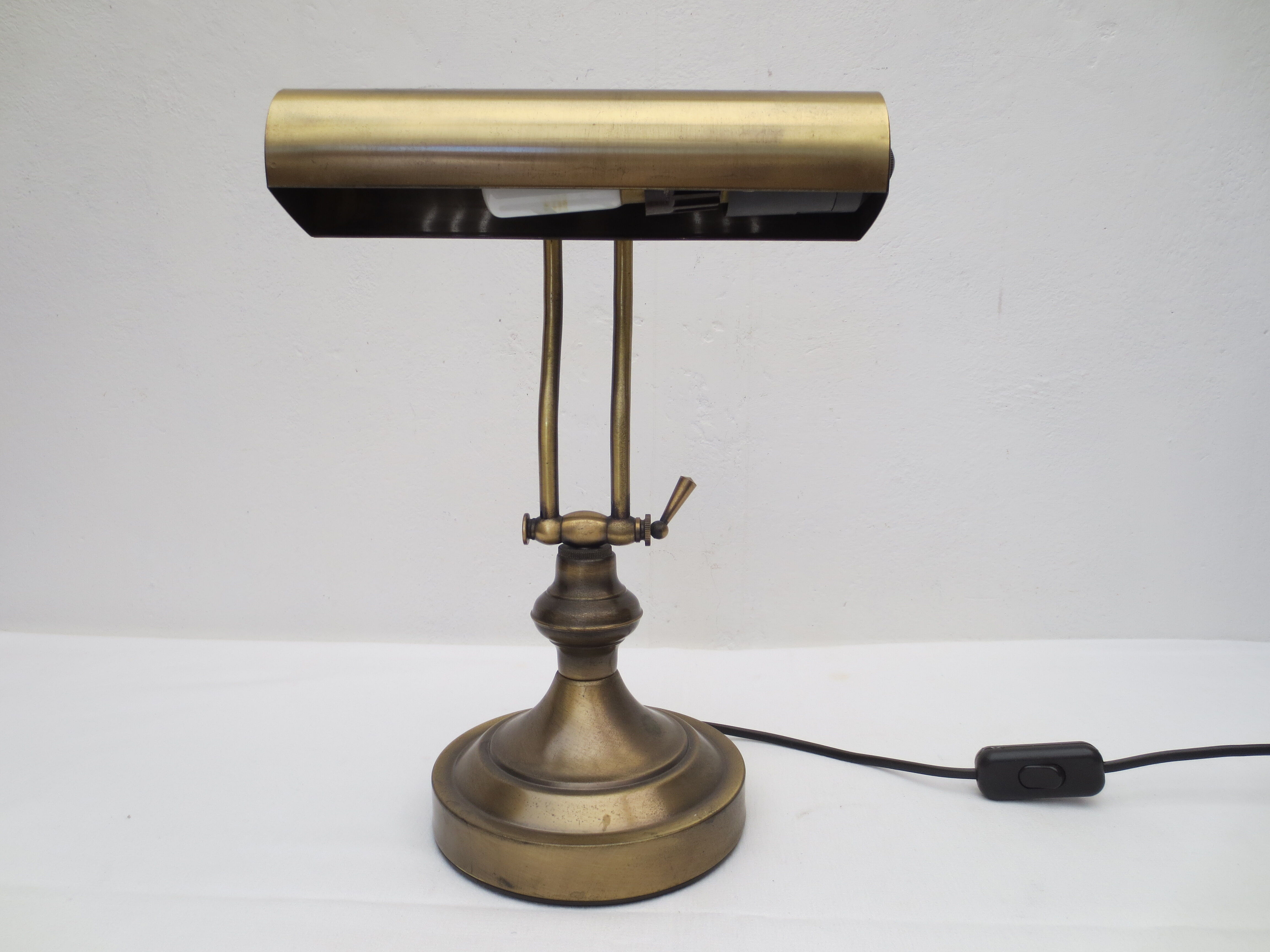 Old aged brass articulated desk lamp