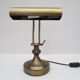 Old aged brass articulated desk lamp