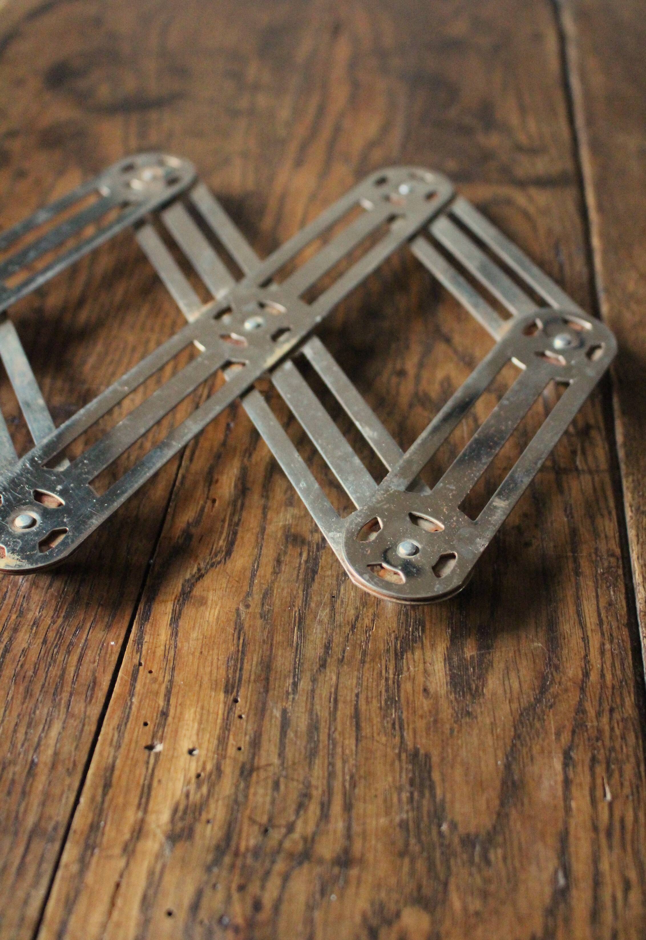 Vintage folding metal trivet